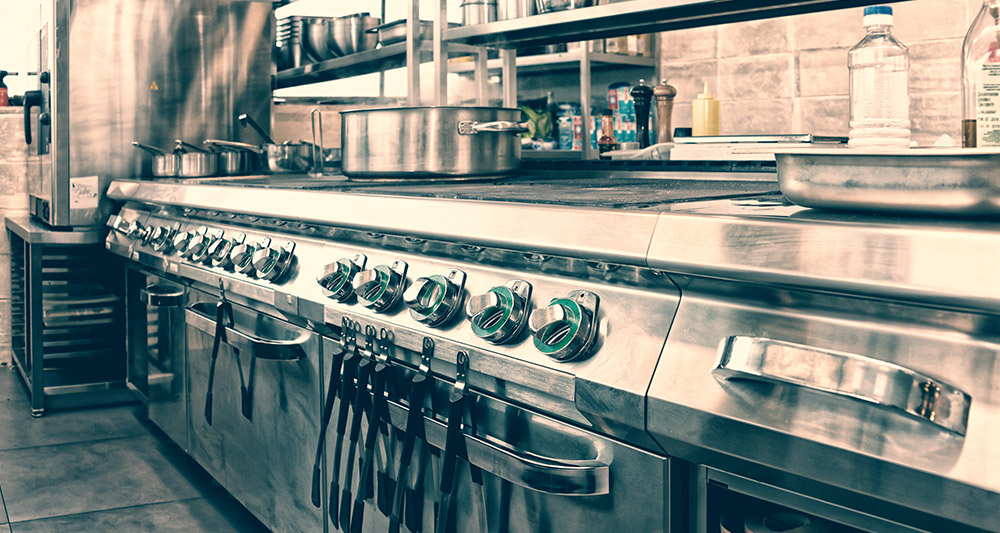 all metal kitchen with pots and pans